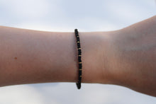 Load image into Gallery viewer, Spaced Black &amp; Gold Seed Bead Bracelet
